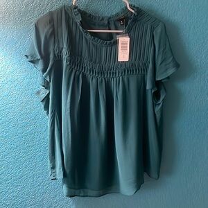 So pretty! NWT green top from Torrid. Dress up or down!